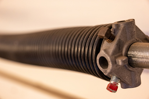 Length-wise perspective of a garage spring