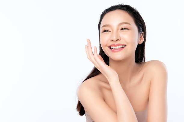 beautiful young asian woman with clean fresh skin. face care, facial treatment, cosmetology, beauty and healthy skin and cosmetic concept .woman beauty skin isolated on white background. - 11877 imagens e fotografias de stock