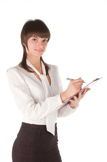 The young girl in white blouse with tablet for papers. isolated. White background