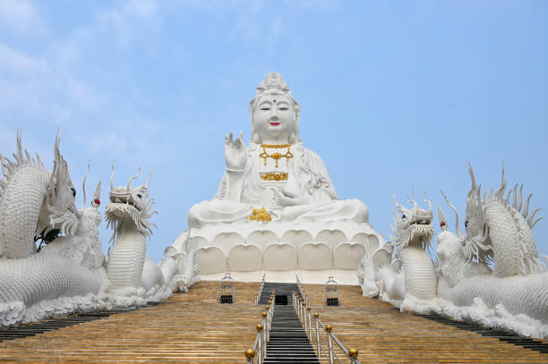 istock White big Guanyin statue in Chiang Rai , Thailand 1212102691