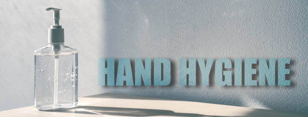 Hand hygiene banner sign for corona virus prevention - proper measures to keep clean hands with alcohol gel rub hand sanitiser on panoramic background.