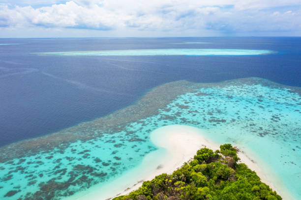 istock Elevated view of tropical island 1212107675