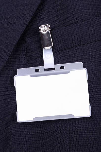 istock Blank identity badge on a dark suit jacket pocket 121211574