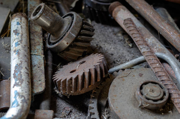 istock Rusty metal and gears lie chaotically. 1212120950
