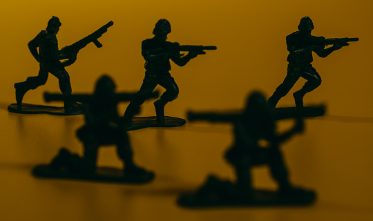 Toy soldiers. Toy green soldiers with guns.