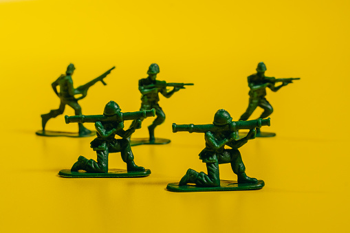 Toy soldiers. Toy green soldiers with guns.