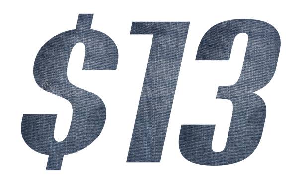 istock 13 Dollar with jeans fabric texture on white background. 1212123110