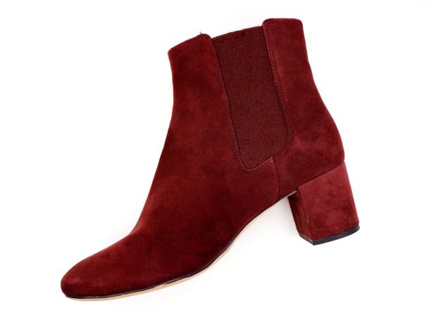 istock Burgundy red felt and leather boots 1212127691