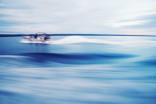 Abstract Sea and Sky Background With Defocused  Motorboat
