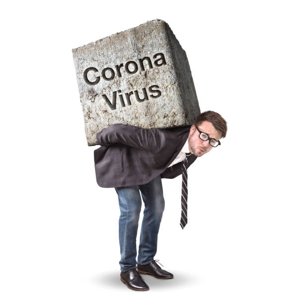 istock Businessman struggling with Corona Virus 1212139701