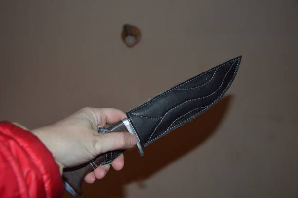 istock Hand-made knife and case in the prison 1212146193