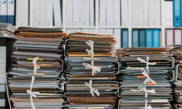 istock Stacks of paperwork in the office 1212148633