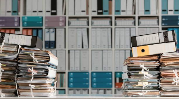 istock Stacks of paperwork in the office 1212148673