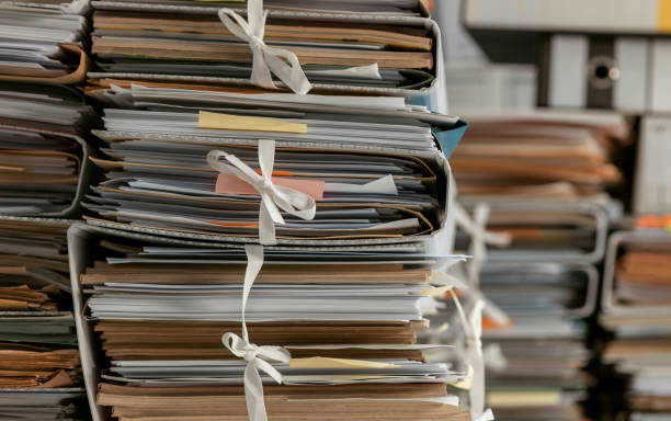 istock Stacks of paperwork in the office 1212148750