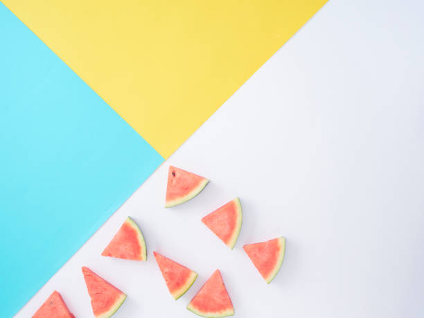 istock Watermelon slice on colorful background with space for text, minimal style concept. 1212149095