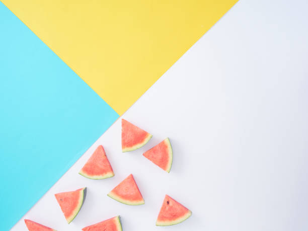 istock Watermelon slice on colorful background with space for text, minimal style concept. 1212149120