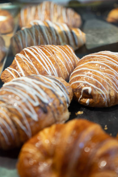 istock Chocolate croissants outside a bakery 1212150471