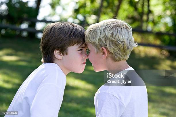 Face Off Stock Photo - Download Image Now - Arguing, Blond Hair, Boys