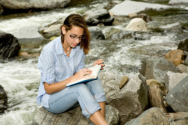 istock Reading by the Stream. 121215118
