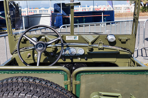 Rome,Italy - July 21, 2019: Rome capital Rally event, an exhibition of vintage cars with beautiful interior and dashboard of off-road veteran car model Fiat Campagnola AR 51 in military green color.