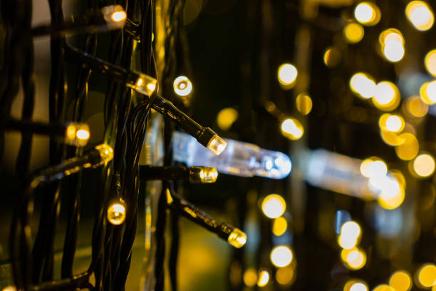 istock close up cable of string led lights on tree in the garden at night time used for decorating for beauty According to important festivals 1212152180