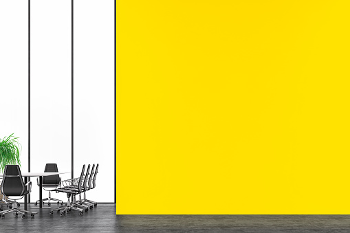 Empty office interior with conference table in front of the windows and potted plant on the left. Empty Pineapple yellow plaster wall with copy space on hardwood tiled floor on the right. 3D rendered image.