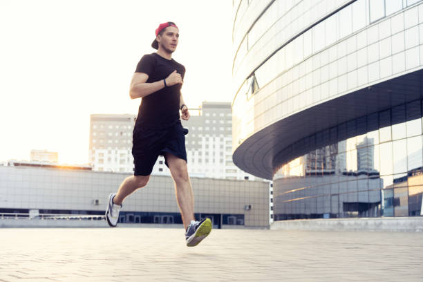 istock Fit athlete running outdoors to stay healthy 1212164421