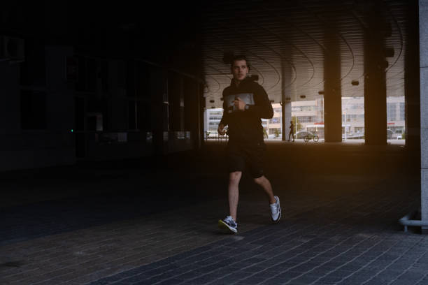 istock Fit athlete running outdoors to stay healthy 1212164482