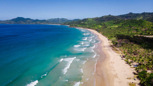 istock Surfing in Duli beach, El Nido, Palawan 1212165034