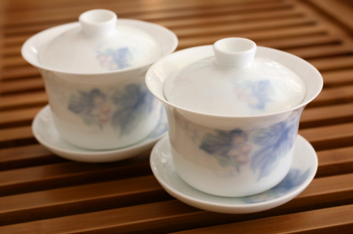 Chinese Tea Cups on Wooden Rack