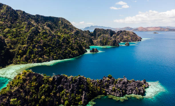 istock Surfing in Duli beach, El Nido, Palawan 1212170572