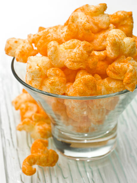 istock Bowl full of corn cheese puffs 121217251