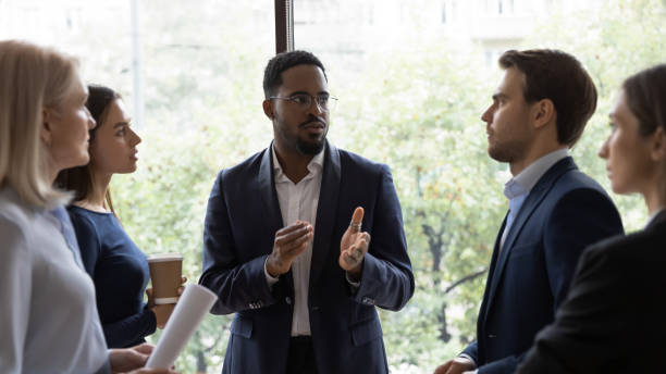istock Diverse colleagues brainstorm discussing ideas cooperating in office 1212172577