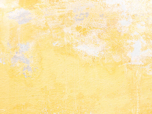 istock Abstract yellow cement wall texture and background. 1212172654