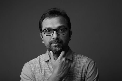 Black and white portrait of a man of Indian ethnicity