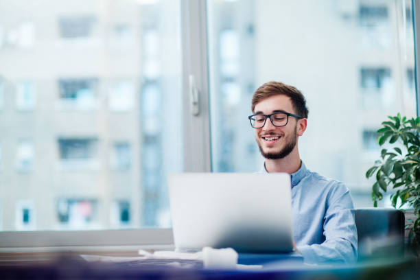 istock Young businessman in office 1212174198