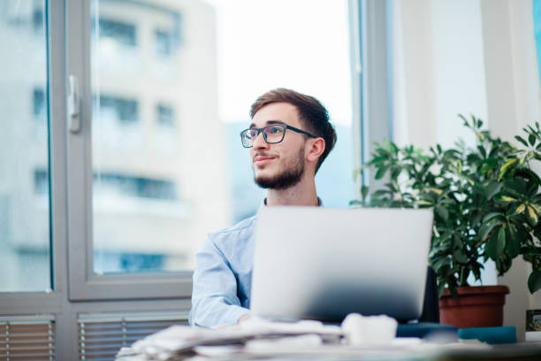 istock Young businessman in office 1212174199