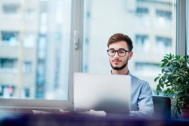 istock Young businessman in office 1212174216