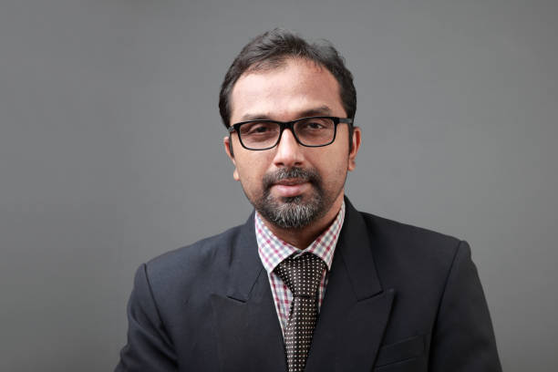 istock Smiling portrait of a middle aged professional 1212174825