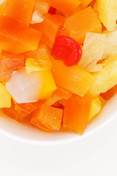 istock Canned fruit cocktail with pineapple, papaya, Nata de Coco and cherries 1212175502