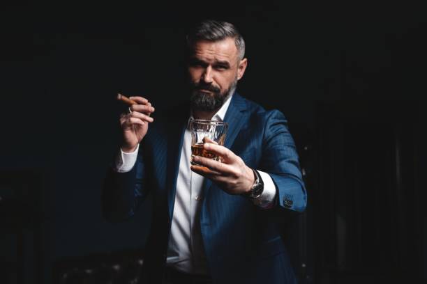 100+ Elegant Man Drinking Scotch Whisky And Smoking Cigar Stock Photos ...