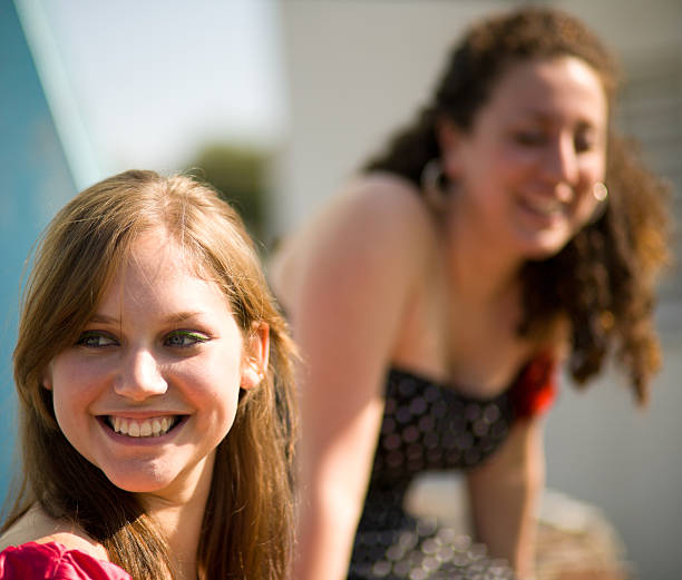 istock young woman smiling toward camera 121217734