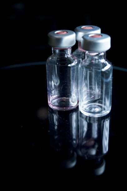 istock Vaccine vials against virus. Coronavirus Vaccine Study 1212179836