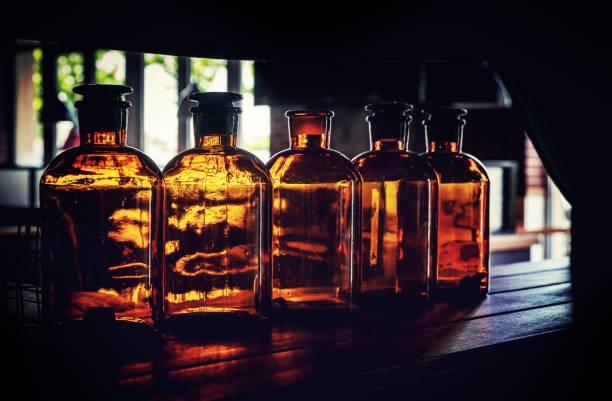 istock A row of glass bottles on a shelf 1212182223