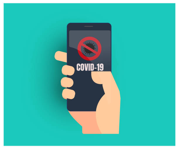 istock technology and corona virus. He says covid-19 on his mobile phone. Smartphone and coronavirus. 1212184721