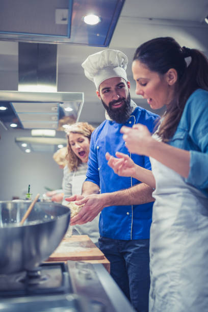 istock Chef supervising and expertise 1212188669
