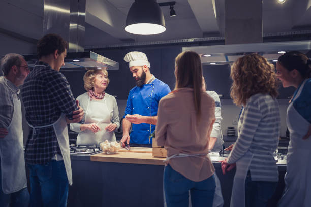 istock Chef supervising and expertise 1212188701