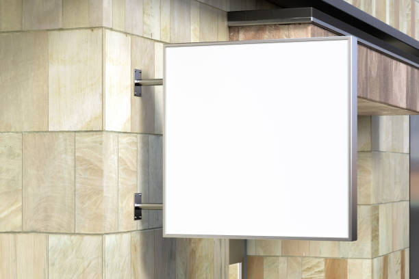 istock Square signboard or signage on the red brick wall with blank white sign mock up. Side view. 1212190238