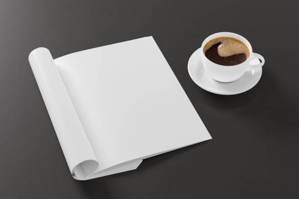istock Blank magazine page. Workspace with folded magazine mock up on the desk. 1212190710
