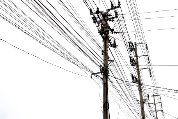 istock A technician climbing on electricity post to fix a problem with safety belt 1212191786